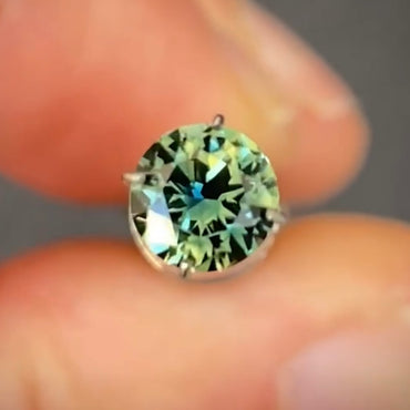Round 0.92ct blue/yellow parti Australian Sapphire (Price Includes A Custom Made Solitare
Ring)