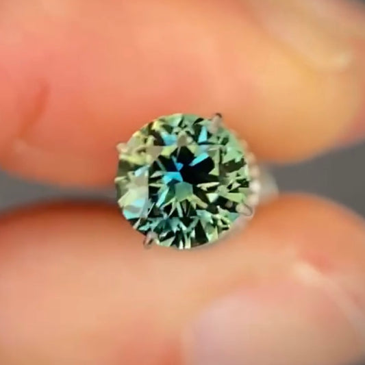 Round 0.92ct blue/yellow parti Australian Sapphire (Price Includes A Custom Made Solitare
Ring)