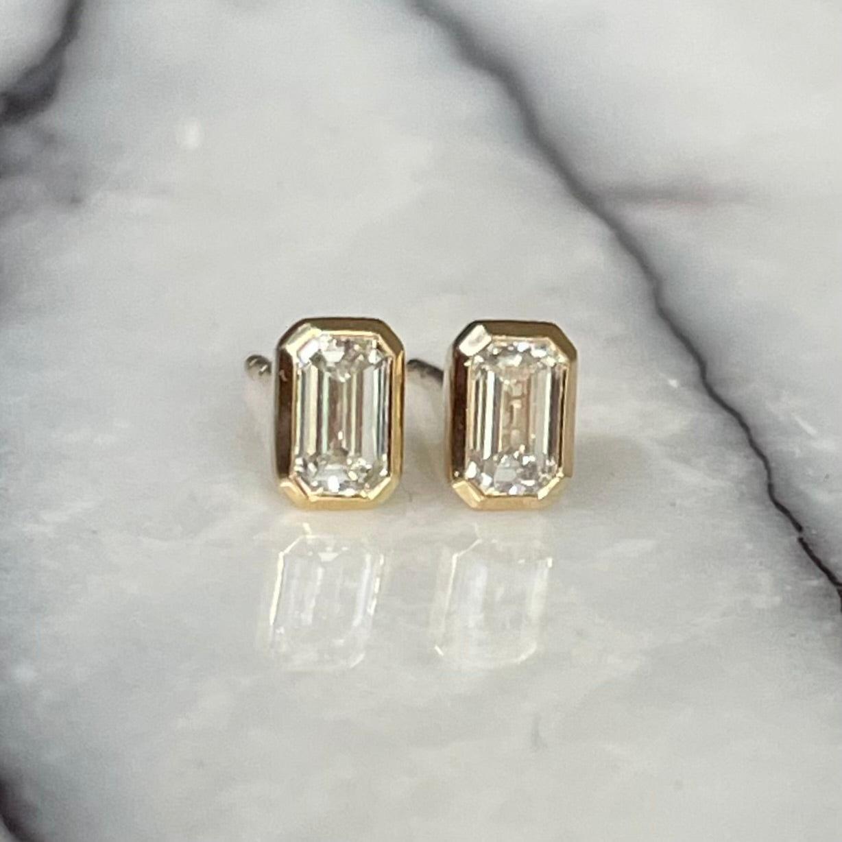 Emerald cut diamond earrings
