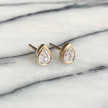 Pear Shaped diamond bezel set Earrings