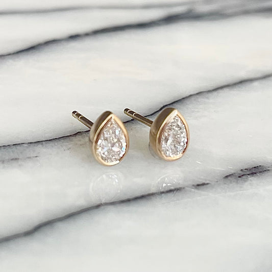 Pear Shaped diamond bezel set Earrings