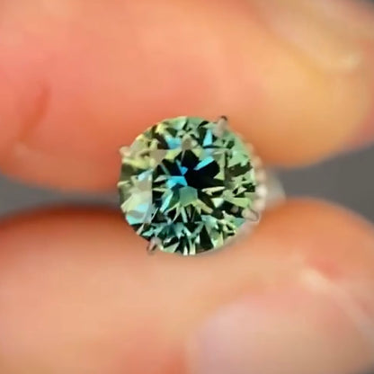 Round 0.92ct blue/yellow parti Australian Sapphire (Price Includes A Custom Made Solitare
Ring)