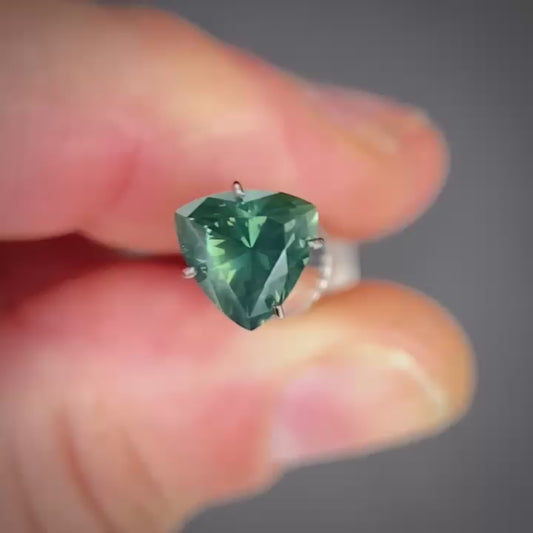Trilliant 1.28ct blue/green opalescent Natural Australian Sapphire
