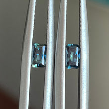 Load image into Gallery viewer, A radiant pair of teal blue Australian sapphires measuring 4.8 x 3mm total weight=0.60ct   Our stones have been ethically sourced from reputable stone merchants. We can also source a variety of stones for you if you have something specific in mind  All photos and videos are taken with natural light   Available for custom making, email for more details    rachel@rachelbethjewellery.com.au