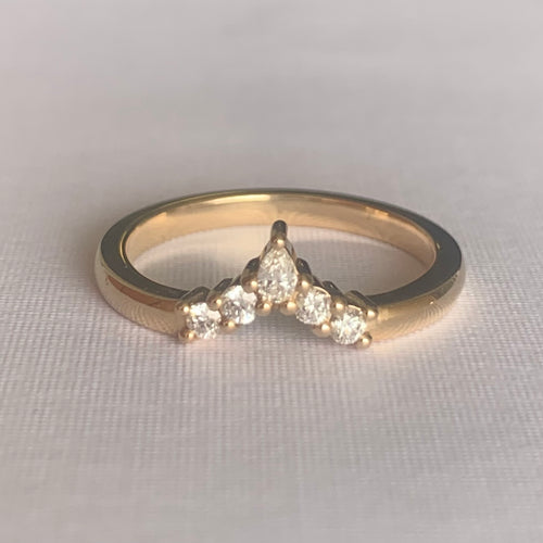 Viola Diamond V Band  Band width 2mm  Finger Size O  14ct Yellow Gold  Complimentary first Size  The Diamonds are Colour F clarity VS featuring four 2mm round brilliant cuts and one 4 x 2mm pear cut diamond.  Made with recycled metal in Sydney   Ethically sourced Gemstones 