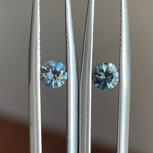 Round pair of light teal Australian sapphires