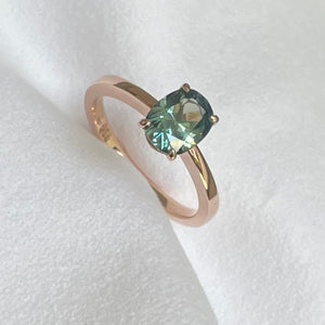 This 14ct Rose Gold Solitaire Eva Ring is beautifully complimented by a 1.33ct oval cut Australian Parti Sapphire, the stone is set with four eagle shaped claws in Rose gold. The Sapphire measures 7.7 x 5.9mm The ring is size L & can be sized to sizes I-R Made with recycled metal in Sydney Ethically sourced Gemstones