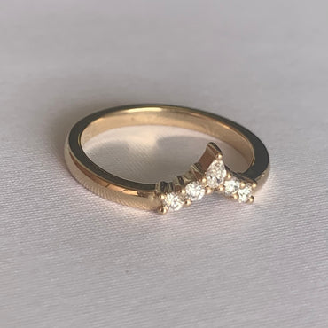 Viola Diamond V Band  Band width 2mm  Finger Size O  14ct Yellow Gold  Complimentary first Size  The Diamonds are Colour F clarity VS featuring four 2mm round brilliant cuts and one 4 x 2mm pear cut diamond.  Made with recycled metal in Sydney   Ethically sourced Gemstones 