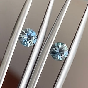 Round pair of light teal Australian sapphires
